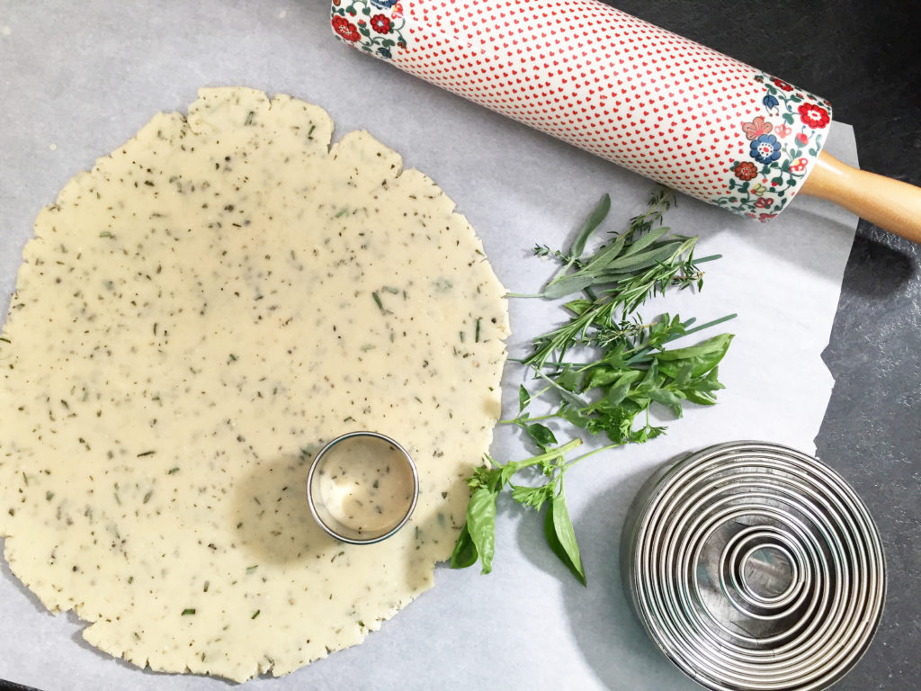 Shortbread dough with herbs and cookie cutter