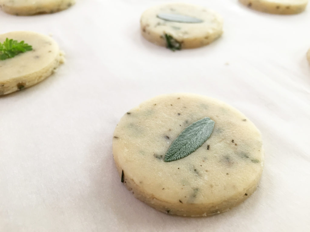 Close up of shortbread cookie with sage