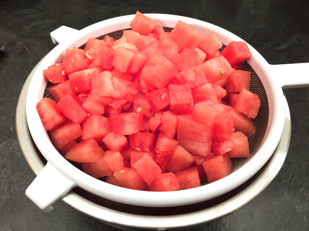 watermelon draining in sieve