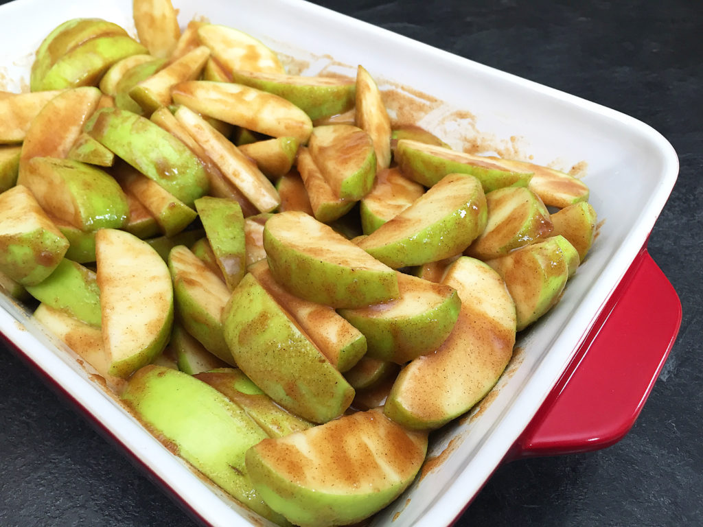 apple cobbler filling in baking dish