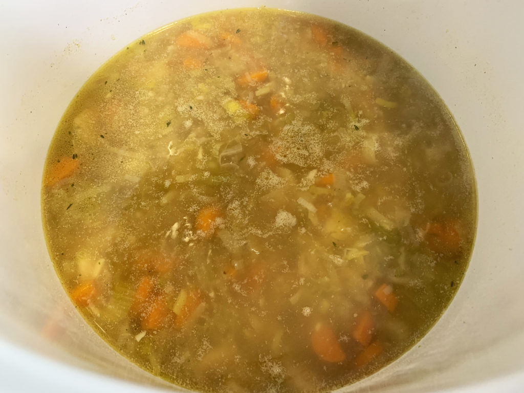 potato leek soup simmering on stove