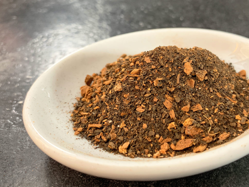 little dish of ground up chai tea