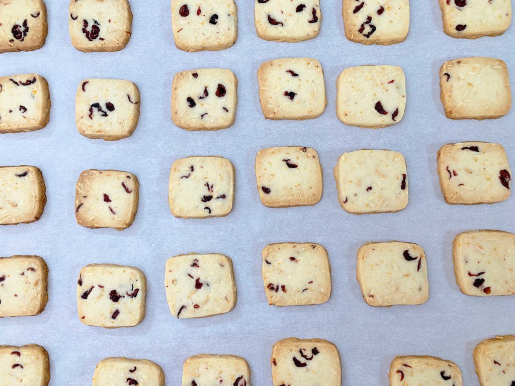 tray of fresh baked cranberry orange almond shortbread cookies