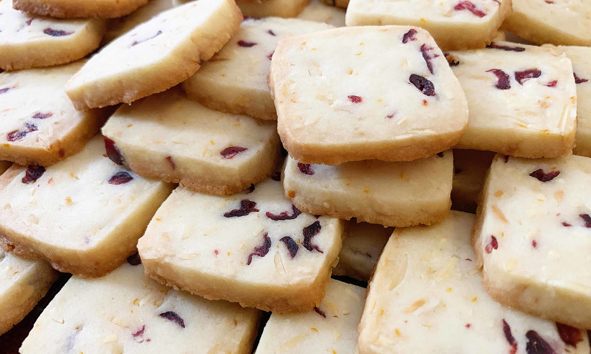 pile of cranberry almond shortbread cookies