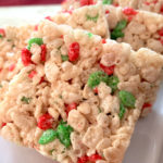rice krispies cut into squares on a plate