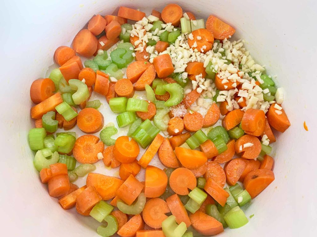 veggies and garlic, cooking in pot with olive oil