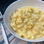 close up shot of a bowl of macaroni and cheese