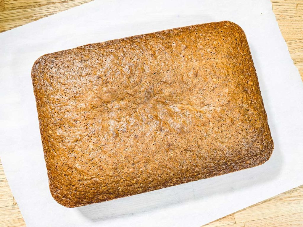 fresh baked carrot cake, cooling on cutting board