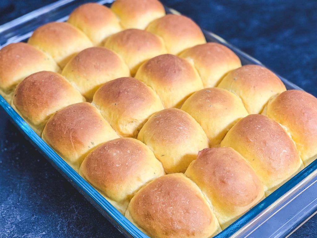 baking dish full of rolls fresh from the oven