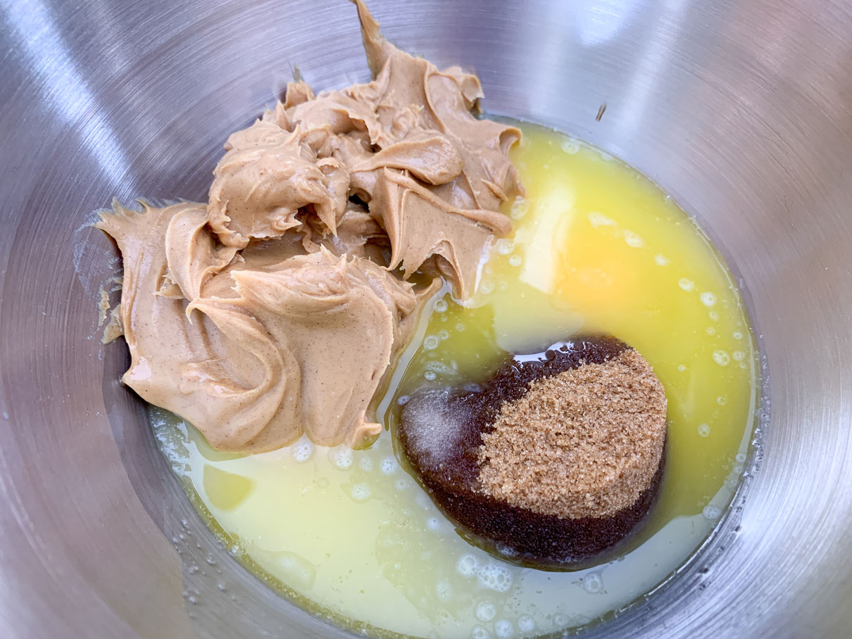 Wet ingredients in the bottom of a mixing bowl