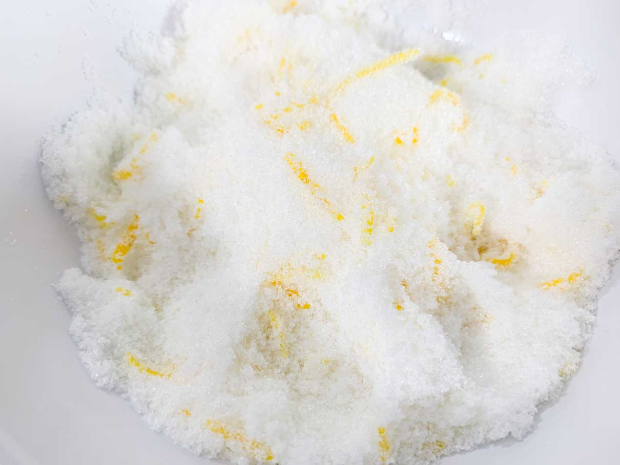 lemon zest and sugar mixed together in a bowl
