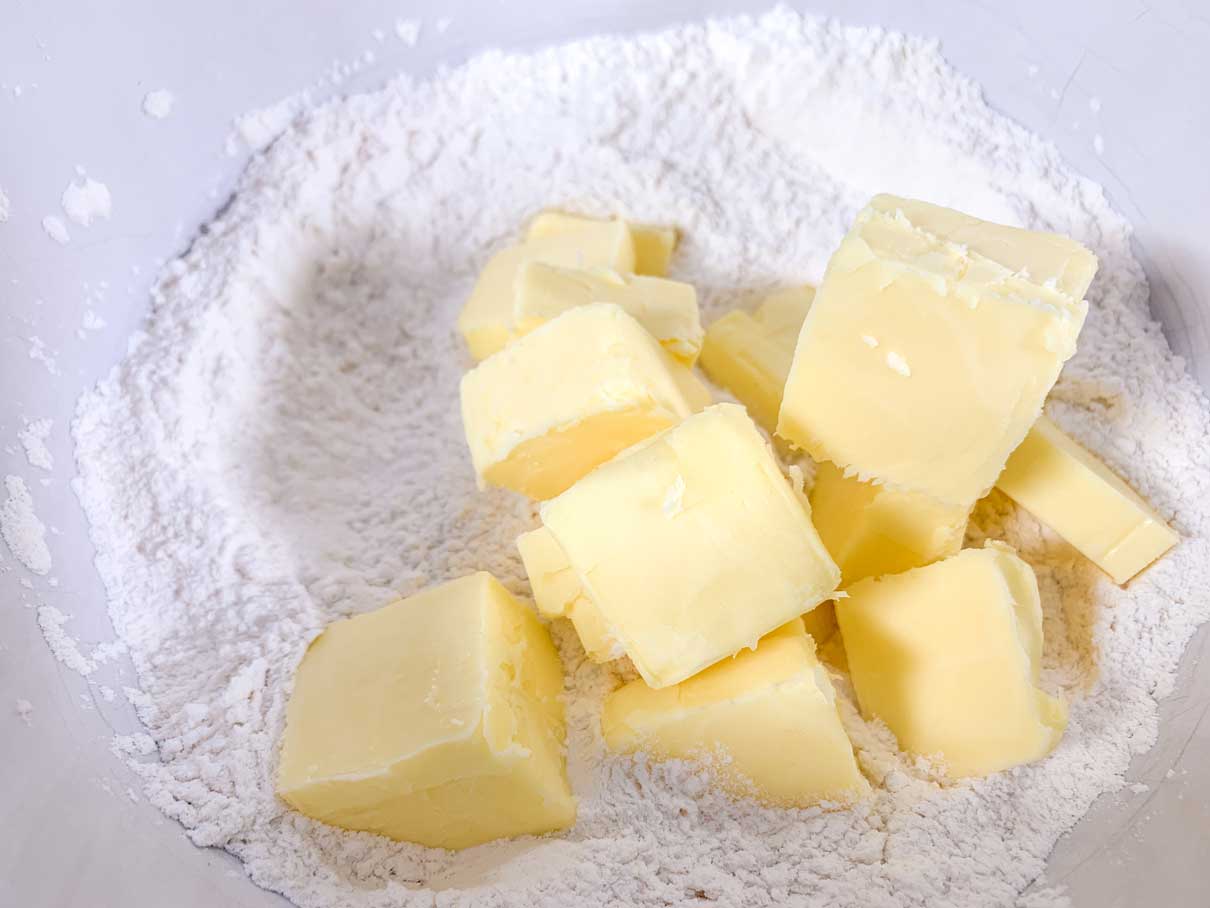 chunks of butter added to dry ingredients