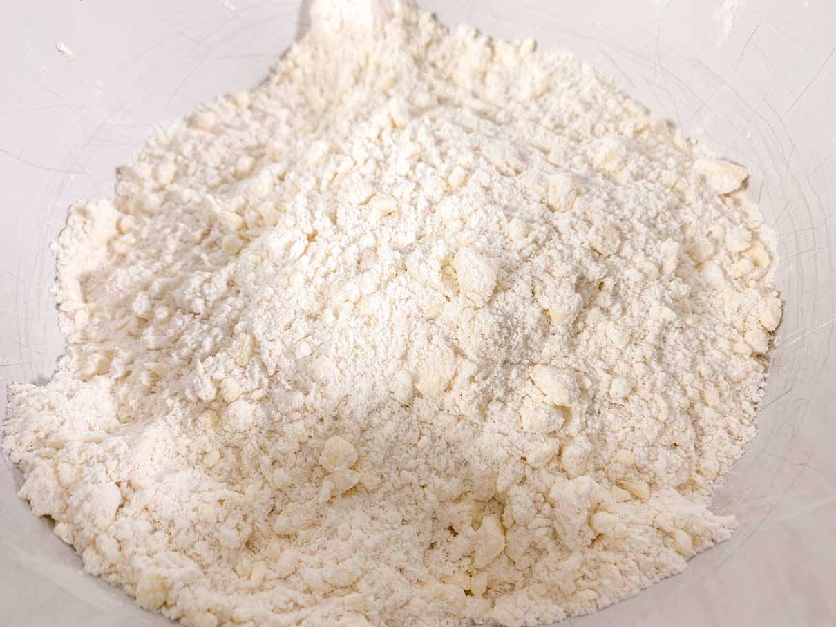 butter cut into dry ingredients and resembling coarse crumbs