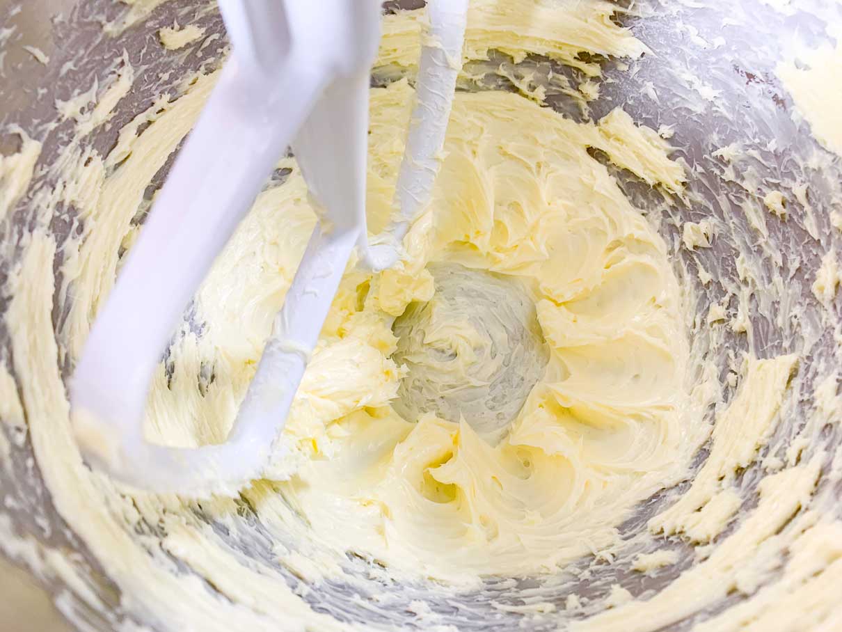 Butter beaten in mixing bowl until softened