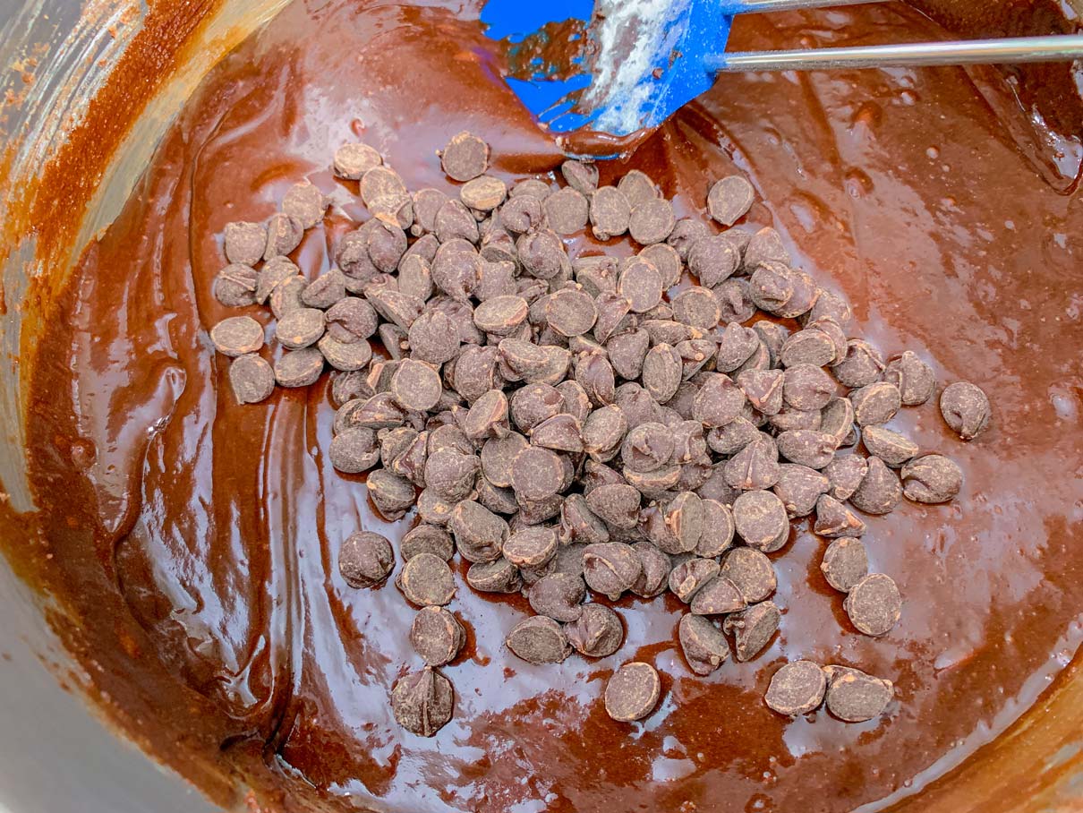 Chocolate chips added to brownie batter