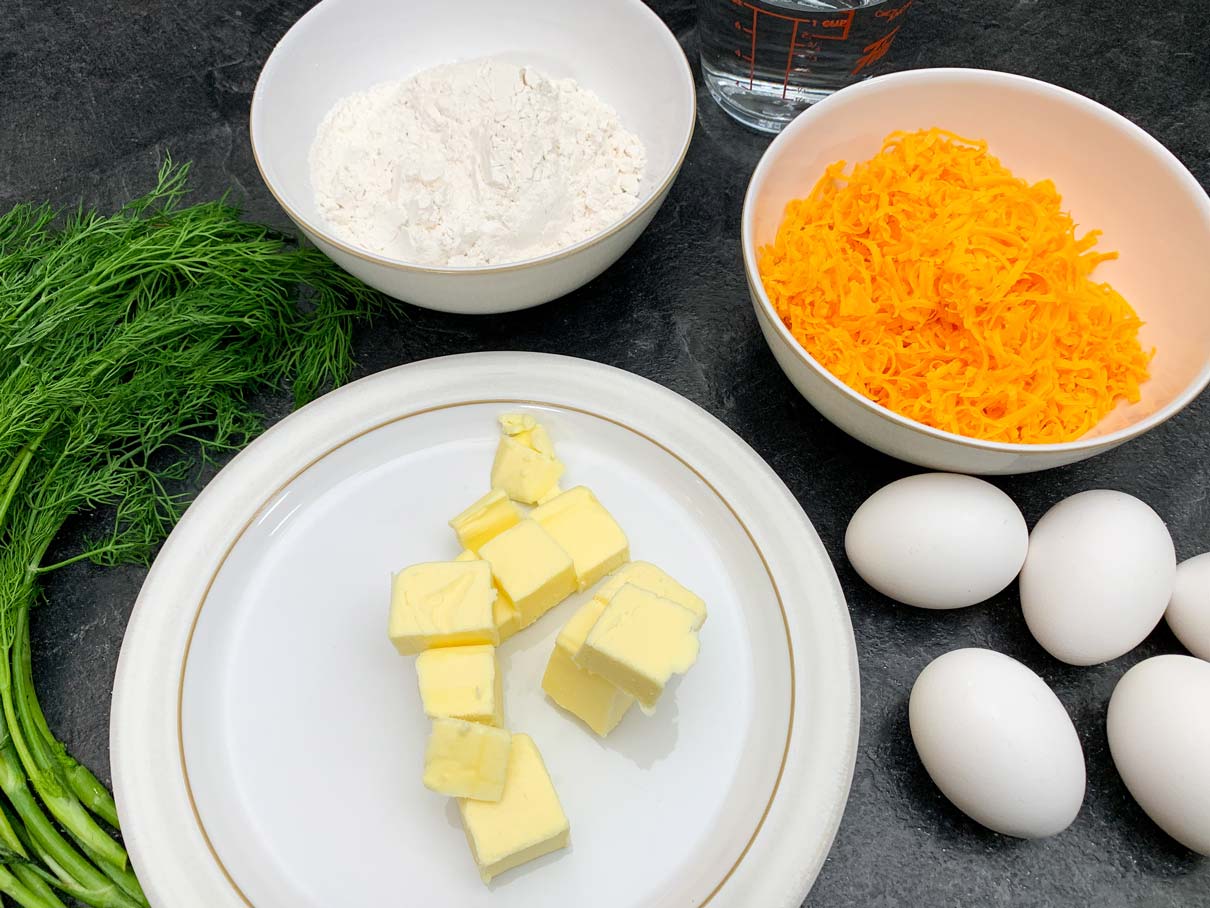 cheddar cheese and dill puff ingredients measured out on the counter