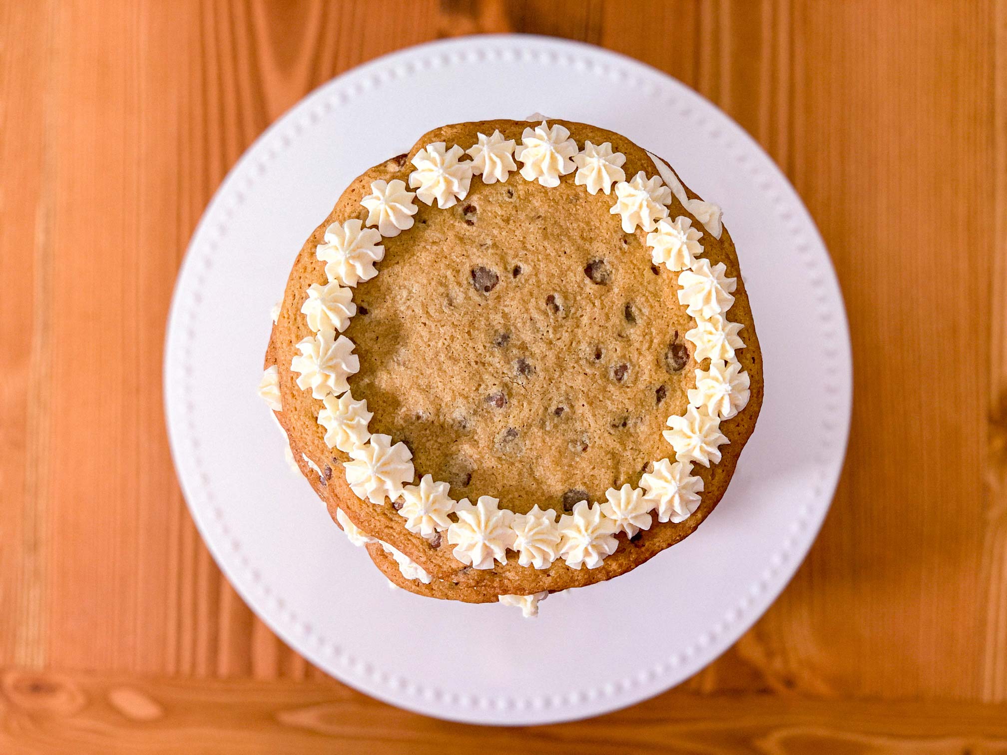 a birds eye view of the fully assembled chocolate chip cookie cake