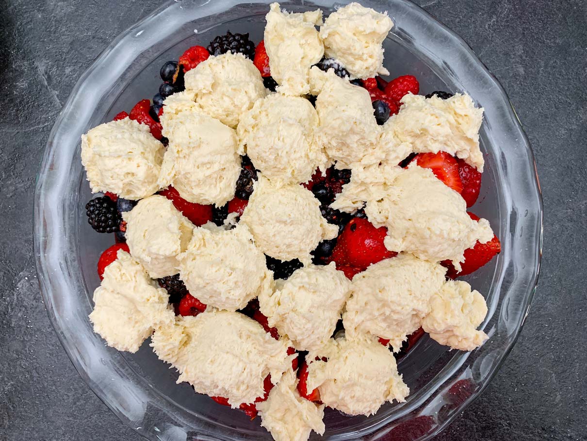 spoonfuls of dough dropped on top of the mixed berry filling