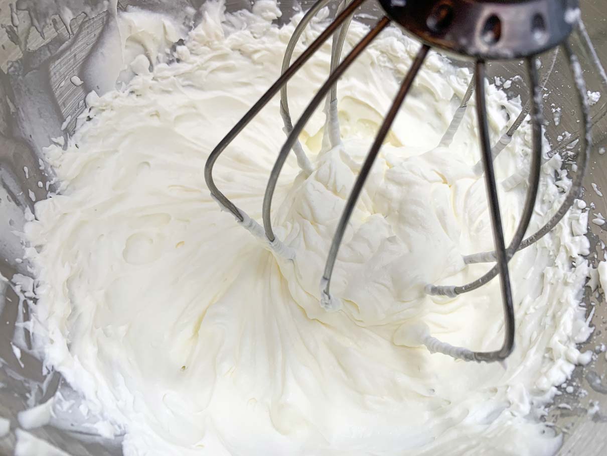 the whipping cream, whipped to medium-stiff peaks