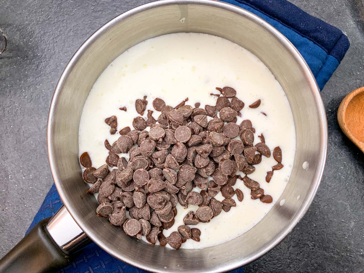 Chocolate and cream in a small saucepan