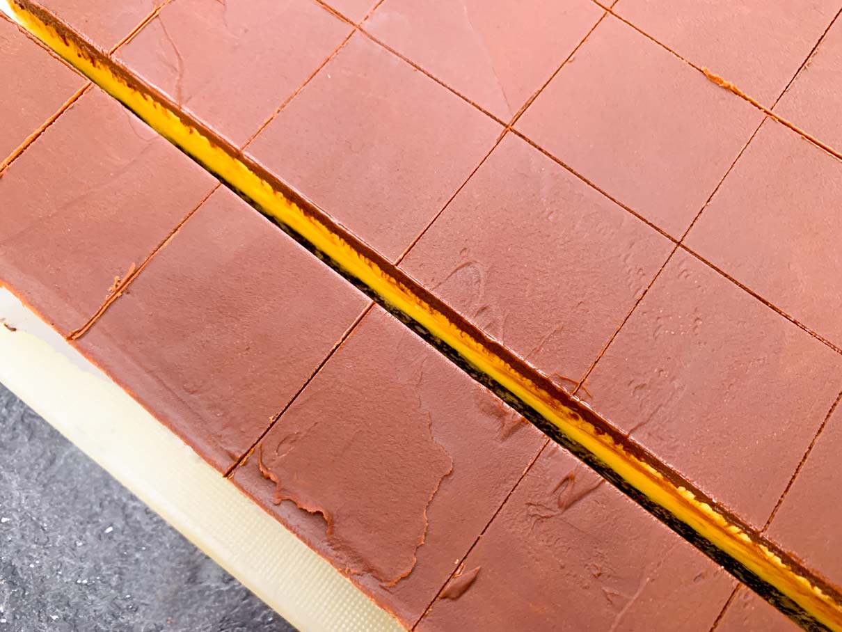 Close up of the first full cut of the Nanaimo bars