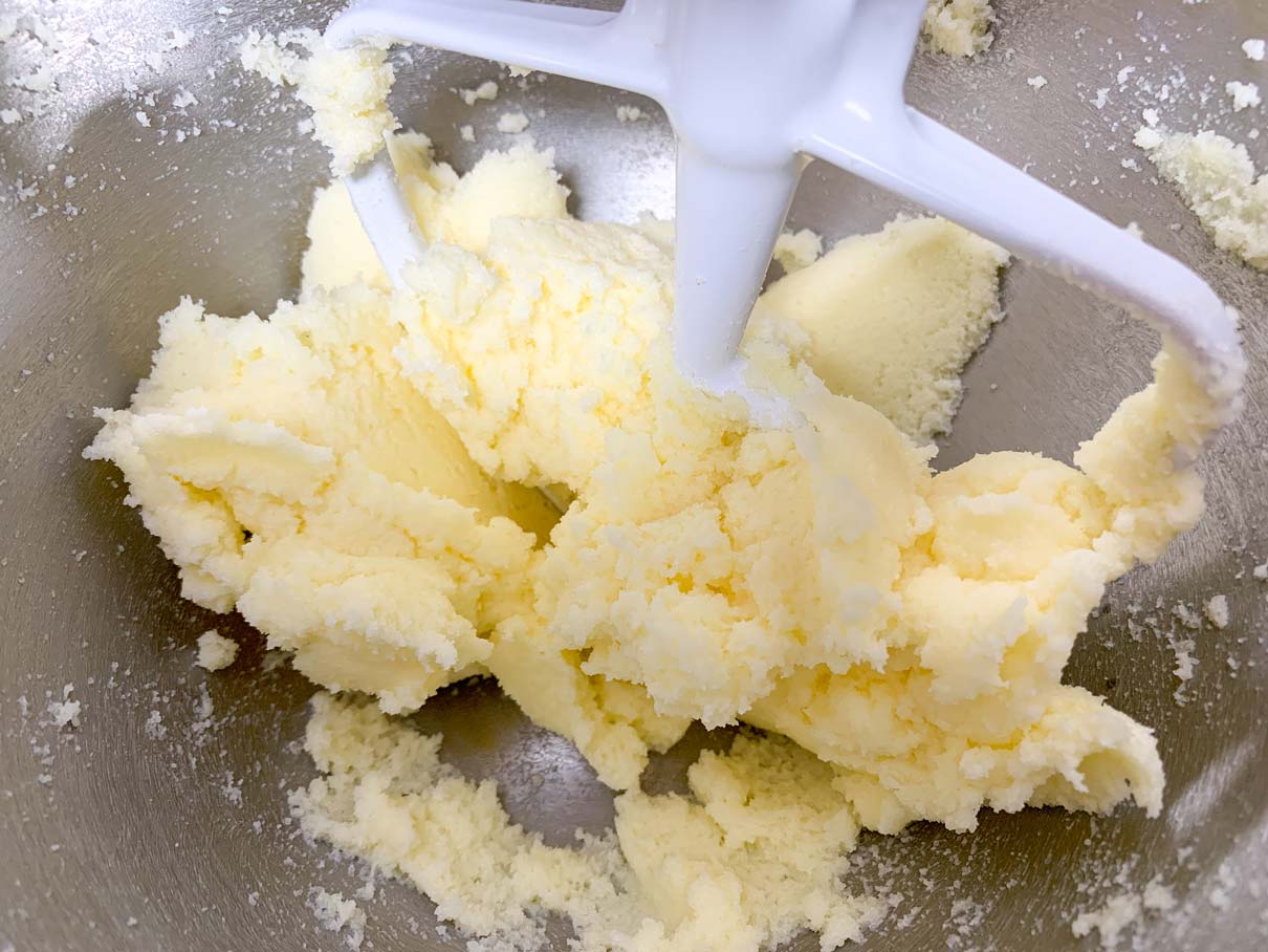 Butter and sugar beaten together in a mixing bowl