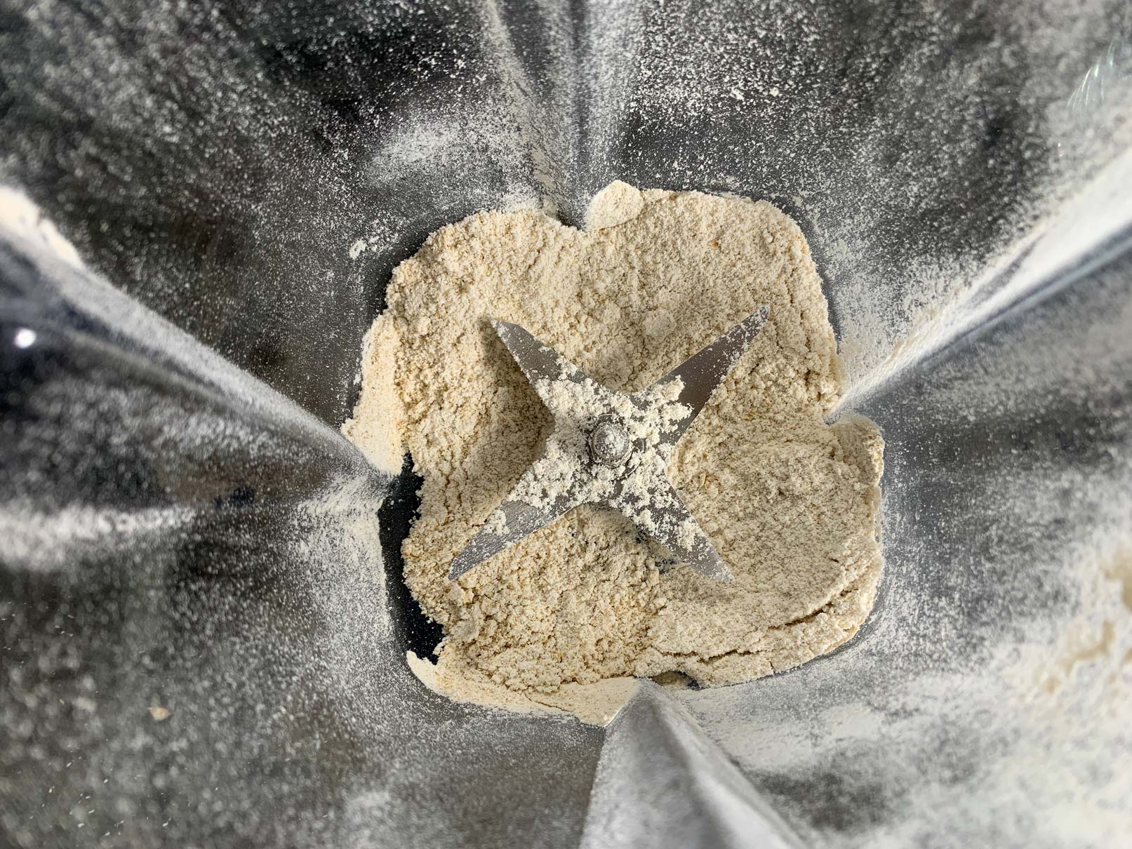 Oats pulverized to powder in a blender