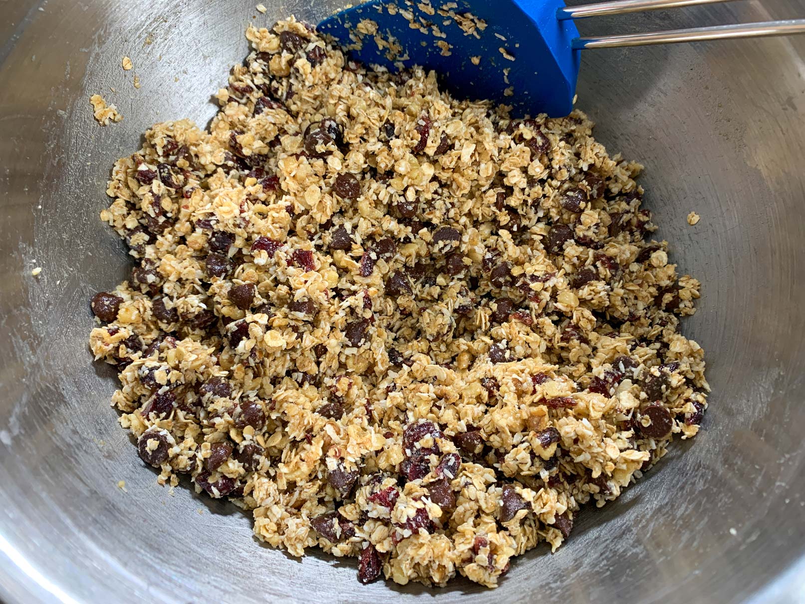 The granola bar mixture all mixed together in a bowl