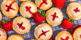 strawberry rhubarb hand pies on a wire cooling rack