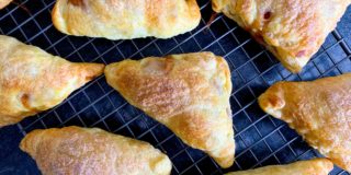 fresh baked apple turnovers, cooling on a wire rack